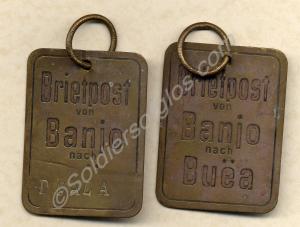Two German mail bag tags, engraved 'Briefpost von