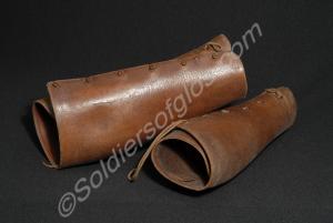 One pair of brown leather officer's leggings, lace