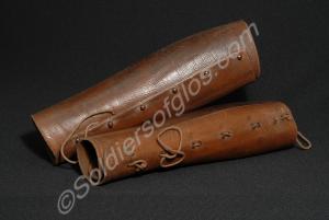 One pair of brown leather officer's leggings, lace