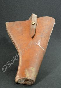 Brown leather pistol holster with strap to hold pi