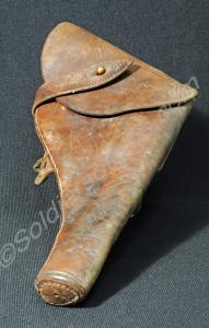 Brown leather pistol holster with flap and strap.