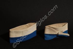 Two United Nations blue and white serge arm bands.