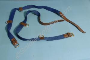 Two blue serge sword belts with leather fittings.