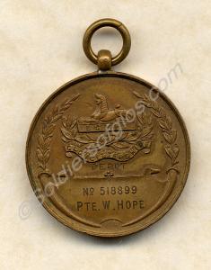 Bronze shooting medal. Inscribed 'Equal best shot