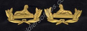Pair of officer's gilt collar badges. 4th (Territo