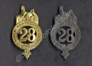 Two bronze Glengarry cap badges. 28th North Glouce