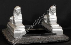 Boot/shoe cleaner. Cast  iron with two silver pain