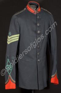 Full dress rifle-green tunic with red facings, arm