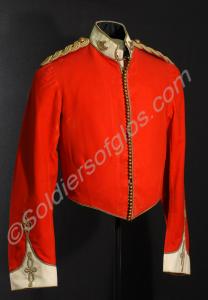 Scarlet mess jacket with white facings, gold braid