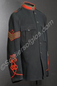 Full dress tunic with red facings, arm badges with