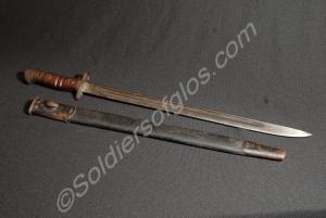 Bayonet and leather with steel tip scabbard. Chapm