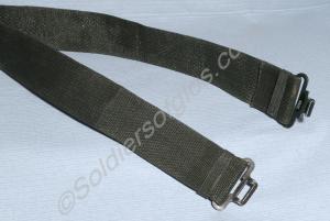 Dark green stiff nylon waist belt, worn with barra