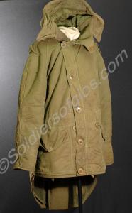 Parka jacket worn over combat smock, with hood, si