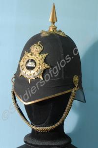 Full dress blue Home Service helmet with badges an