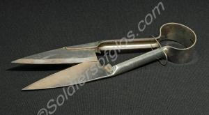 Sheep shearing shears and a silver plate. Used by