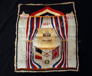 Embroidered panel decorated with sphinx, flags, fr