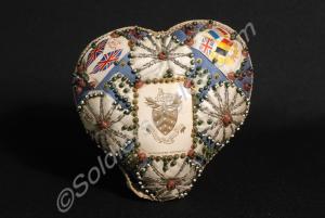 Heart-shaped pincushion with Gloucestershire Regim