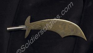 Brass paper knife, shaped like a kukri chased with