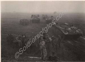 German P.O.W.s preparing to enter Buffalo amphibio