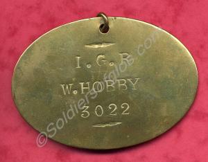 Brass Bed Plate, Oval. Belonging to Private W. Hob