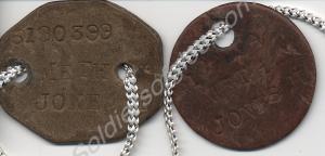 Two identity discs. 5190399 Private H. Jones. Glou