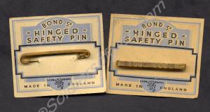 Two tie pins. Property of 4557 Private J. Bailey.