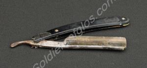Cut-throat shaving razor (broken grip) made for Ch