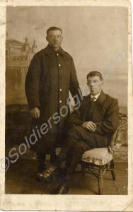 19131 Private Edgar Jones in greatcoat with anothe