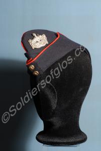 Blue side cap with red piping and white metal fron