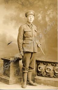 Soldier with swagger stick, c. 1918. Unit unidenti