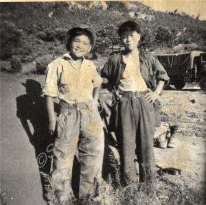 Two Korean boys. 1st Battalion, The Gloucestershir