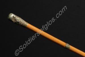 Regimental swagger stick. With a damaged crested t