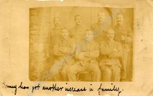 Group of soldiers c. 1914. "Tommy has got another