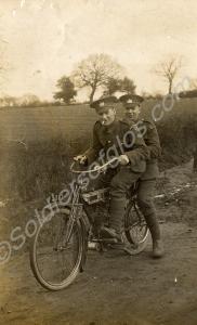 Two soldiers sitting on a motorcycle. 6th (Territo