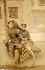 Three soldiers with a motorcycle. Gloucestershire