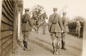 Mounted officer takes a parade. Lieutenant-Colonel