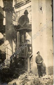 Soldier standing inside a ruined church. 1/4th Bat