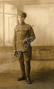 Portrait of a soldier of wearing spurs and carryin