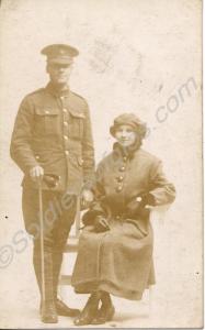 Portrait of a soldier standing with young woman se