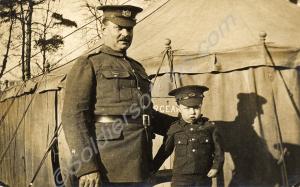 Warrant Officer and very small boy in uniform. Pro