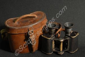 Pair of binoculars in leather case, in working ord