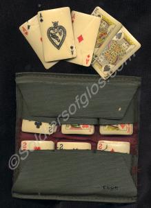 Pack of celluloid miniature playing cards in green