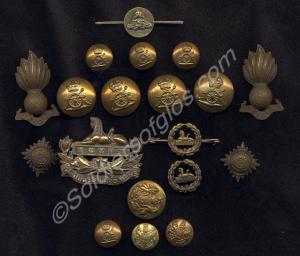 Small wooden box with metal badge on top. Containi
