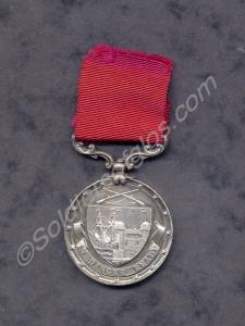 Slver shooting medal. Highest Score in The Bisley