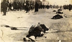 Dead bodies lying in road.  2nd Battalion, The Glo