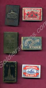 Three matchbox covers with match boxes and matches
