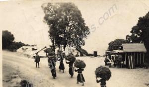 View of India/Burma - Peasants walking along a roa