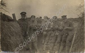 Five soldiers having a meal in a trench.  1/4th Ba