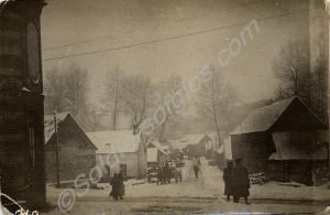Soldiers in a village snow scene.  1/4th Battalion