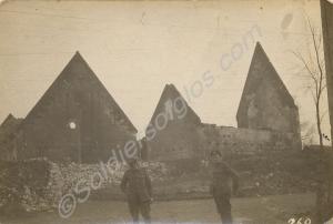 Two soldiers by a ruined church.  1/4th Battalion,